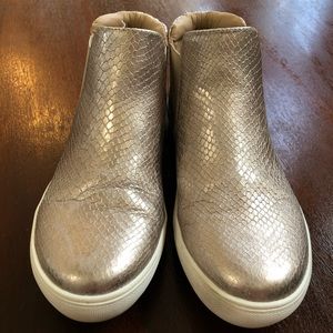 Metallic gold high top slip on sneakers